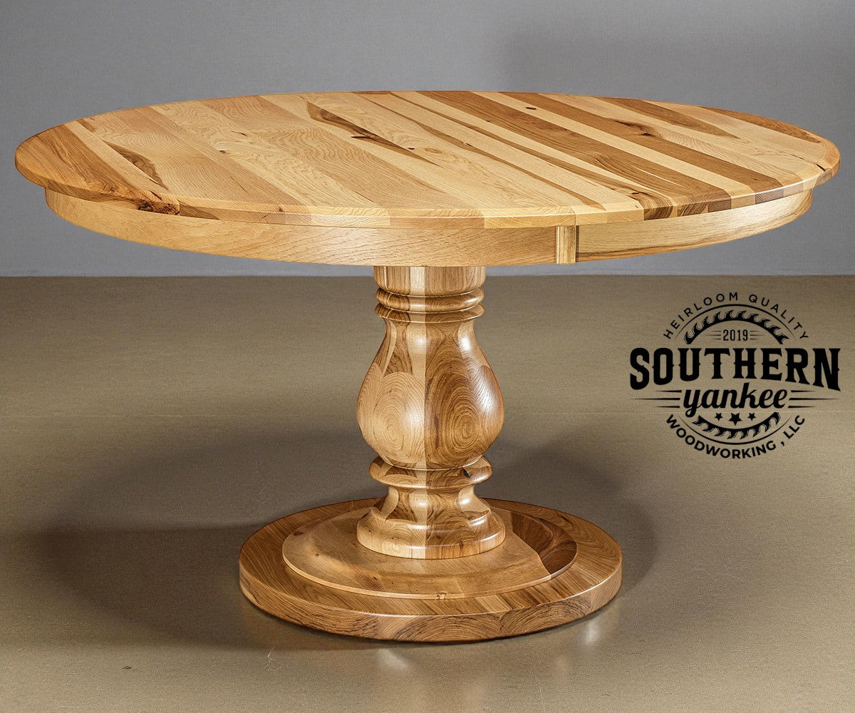 Wooden table with a round top and pedestal base on a gray background, featuring the Southern Yankee Woodworking logo.