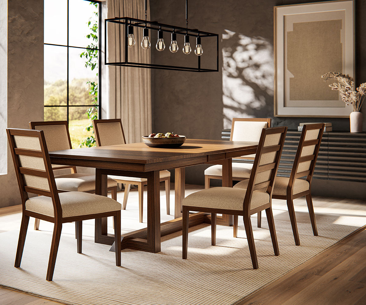 Dining room with wooden table and chairs, modern light fixture, and large window.