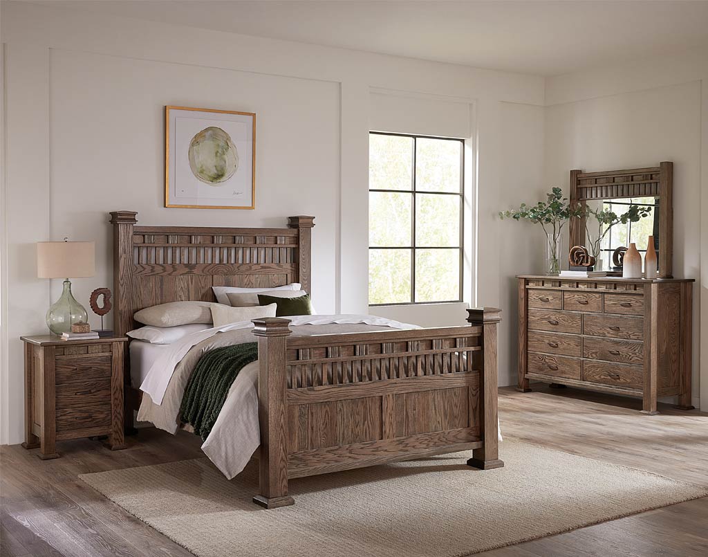 Wooden bedroom furniture set including bed, nightstands, and dresser in a room with a window.