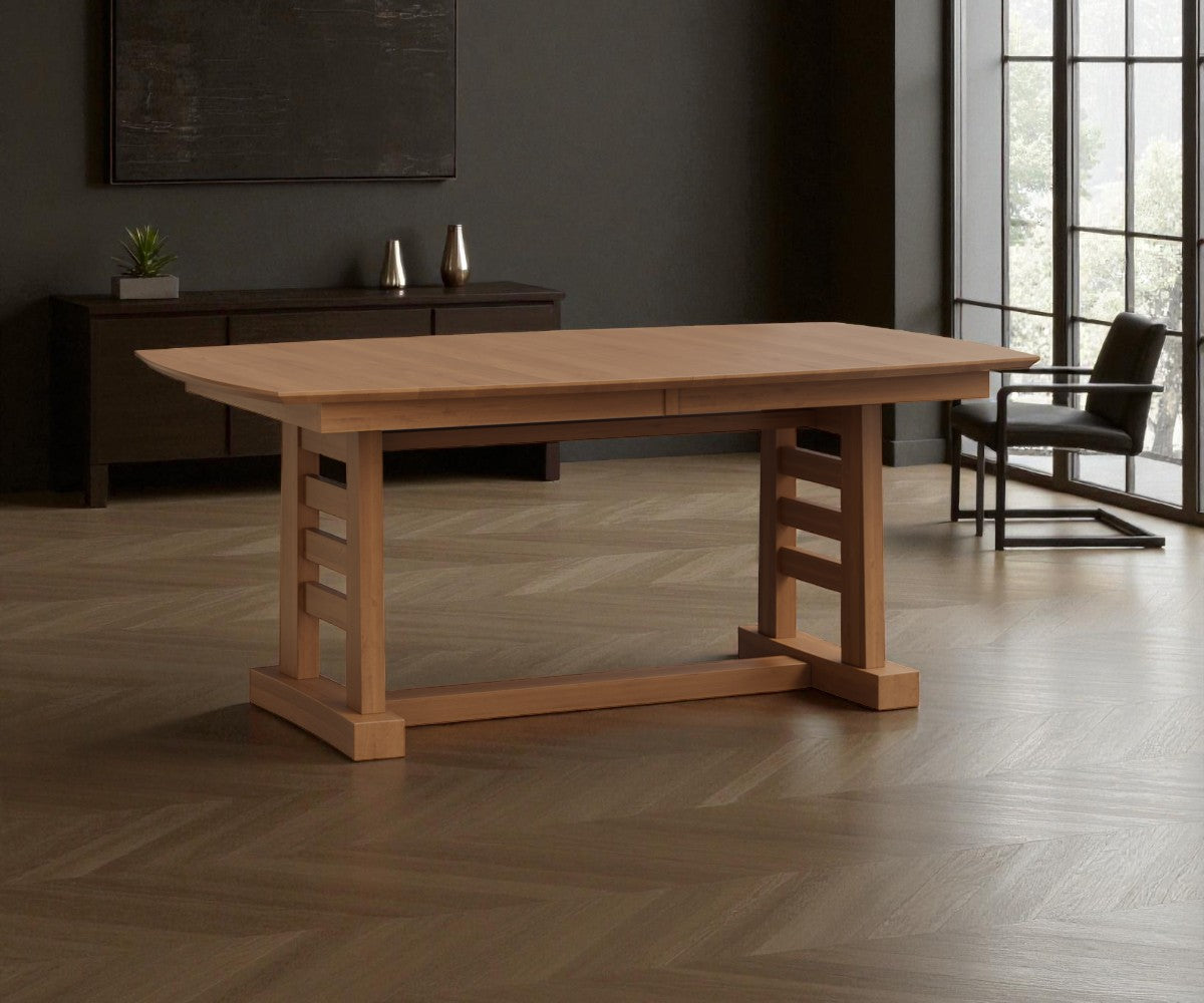 Wooden dining table in a room with a dark wall and large window.