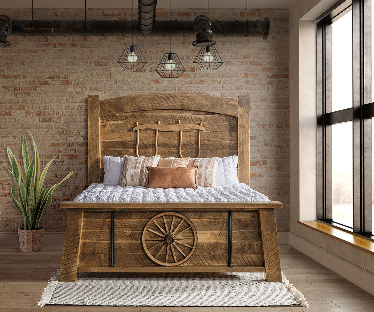 Wooden bed with rustic design in a room with brick wall and large window.