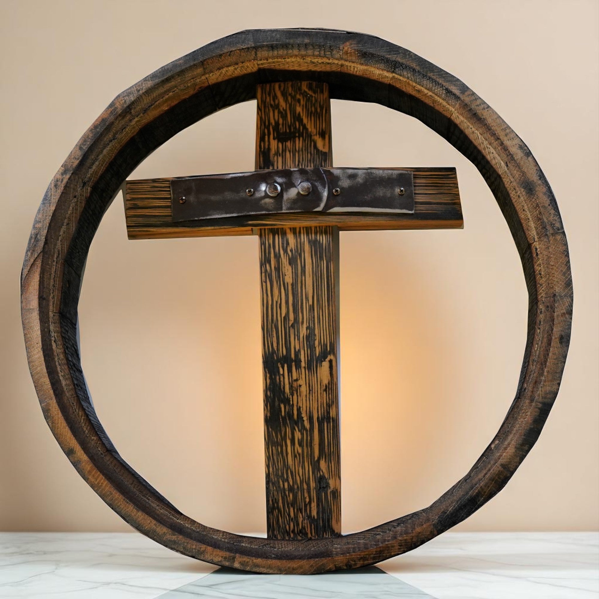 Wooden cross with circular wooden frame on a beige background