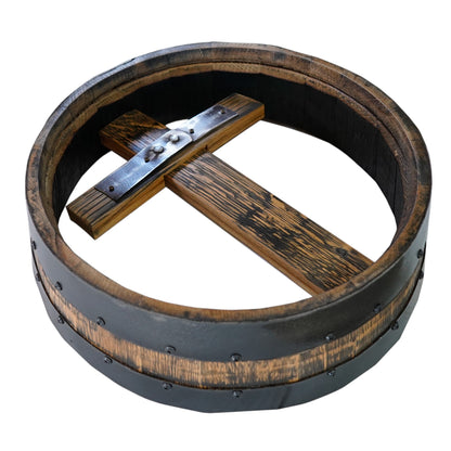 Wooden barrel with metal crossbar on a white background