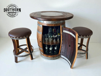 Barrel-shaped table with open cabinet displaying bottles and glasses, accompanied by two stools. Brand 'Southern Yankee Woodworking' visible.